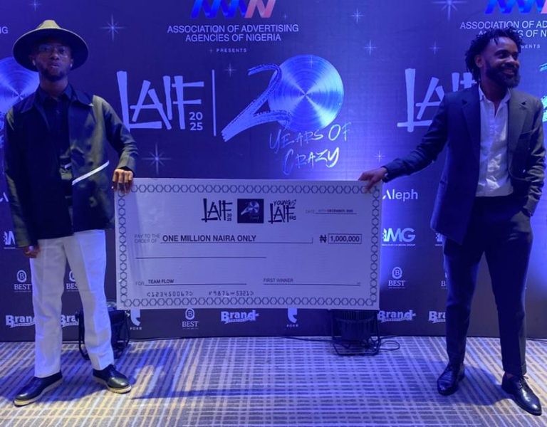 Team FLOW receiving their prize at the LAIF awards